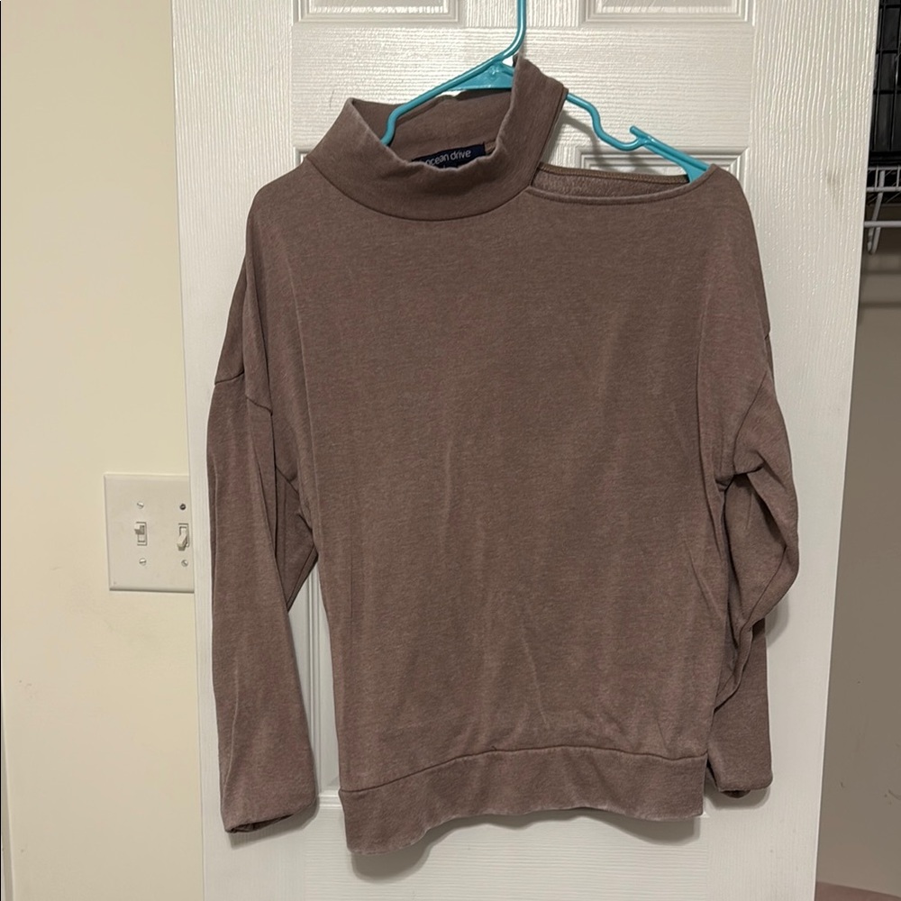 Sweater with cutout shoulder